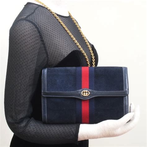 vintage gucci navy handbag|gucci suede handbag.